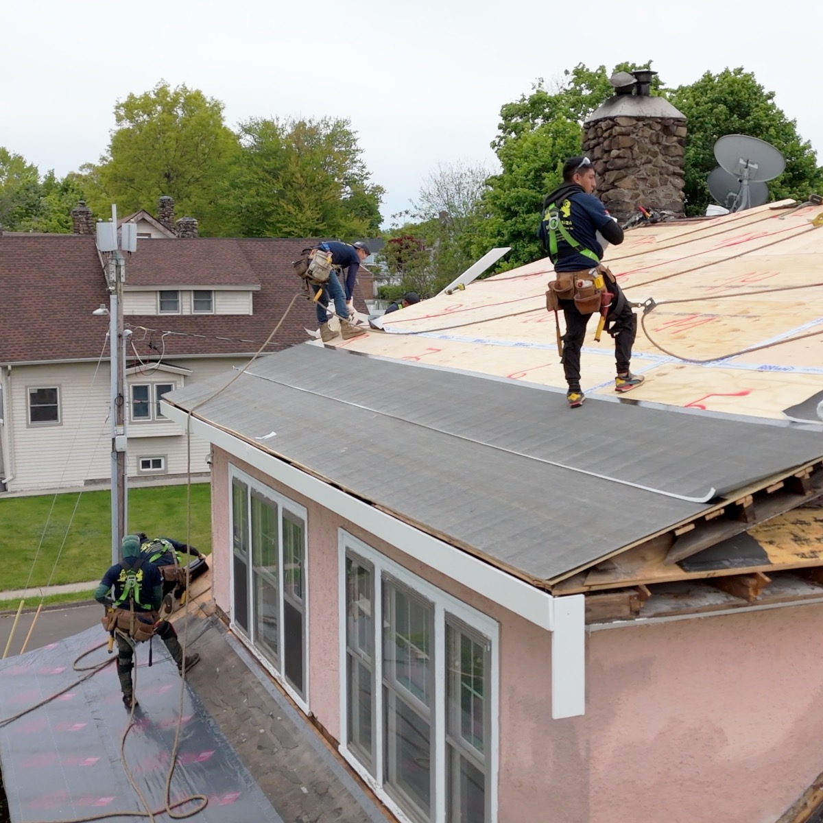 Tear-off & decking · Crew at work